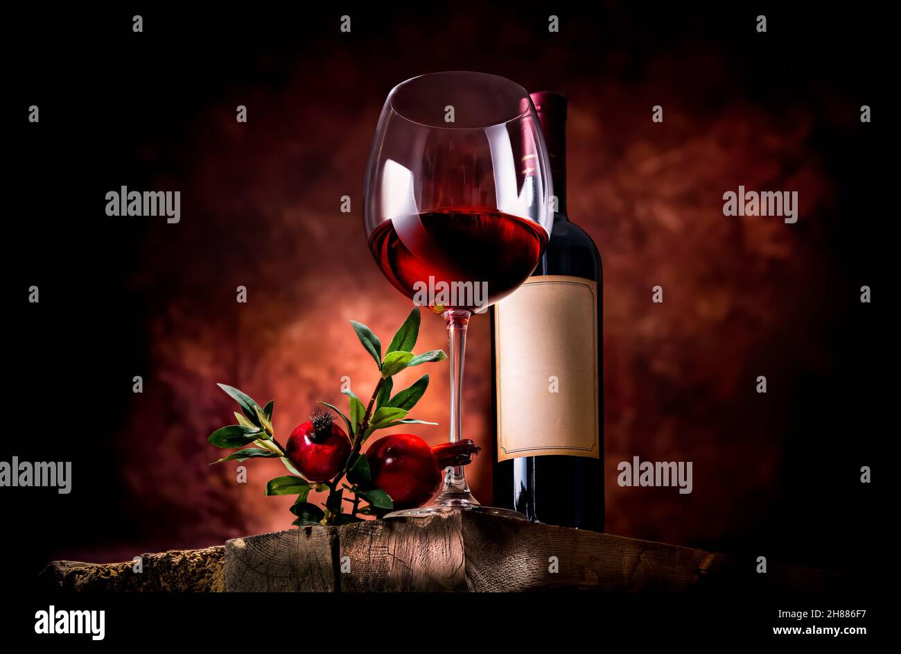 Top view pomegranate wine, bottle opener and fruit Stock Photo - Alamy