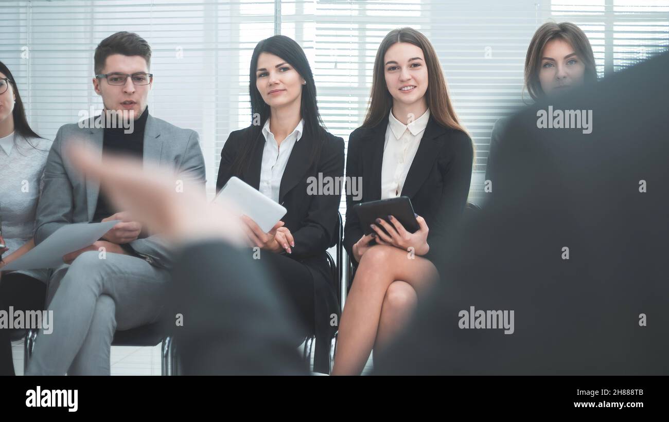 project Manager making a report for the working group Stock Photo
