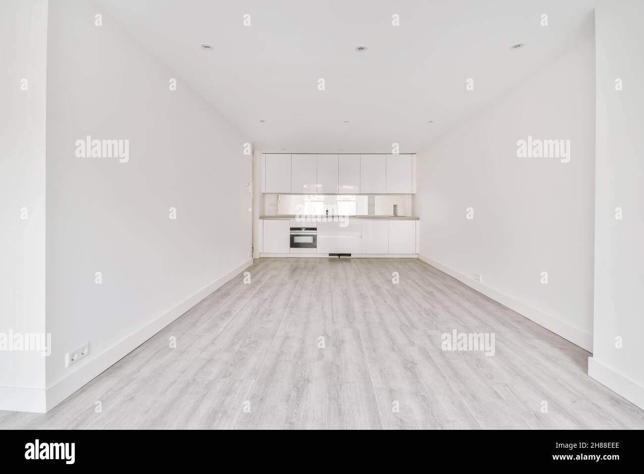 Interior of empty home kitchen with contemporary appliances. A large ...