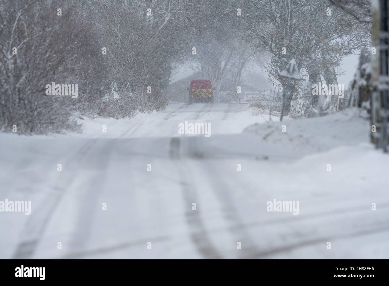 Hawes, North Yorkshire, UK. Nov 28th 2021 - Snow in the aftermath of Storm Arwen is making driving conditions difficult in the Yorkshire Dales, here at Simonstone, near Hawes in Wensleydale, UK. Credit: Wayne HUTCHINSON/Alamy Live News Stock Photo