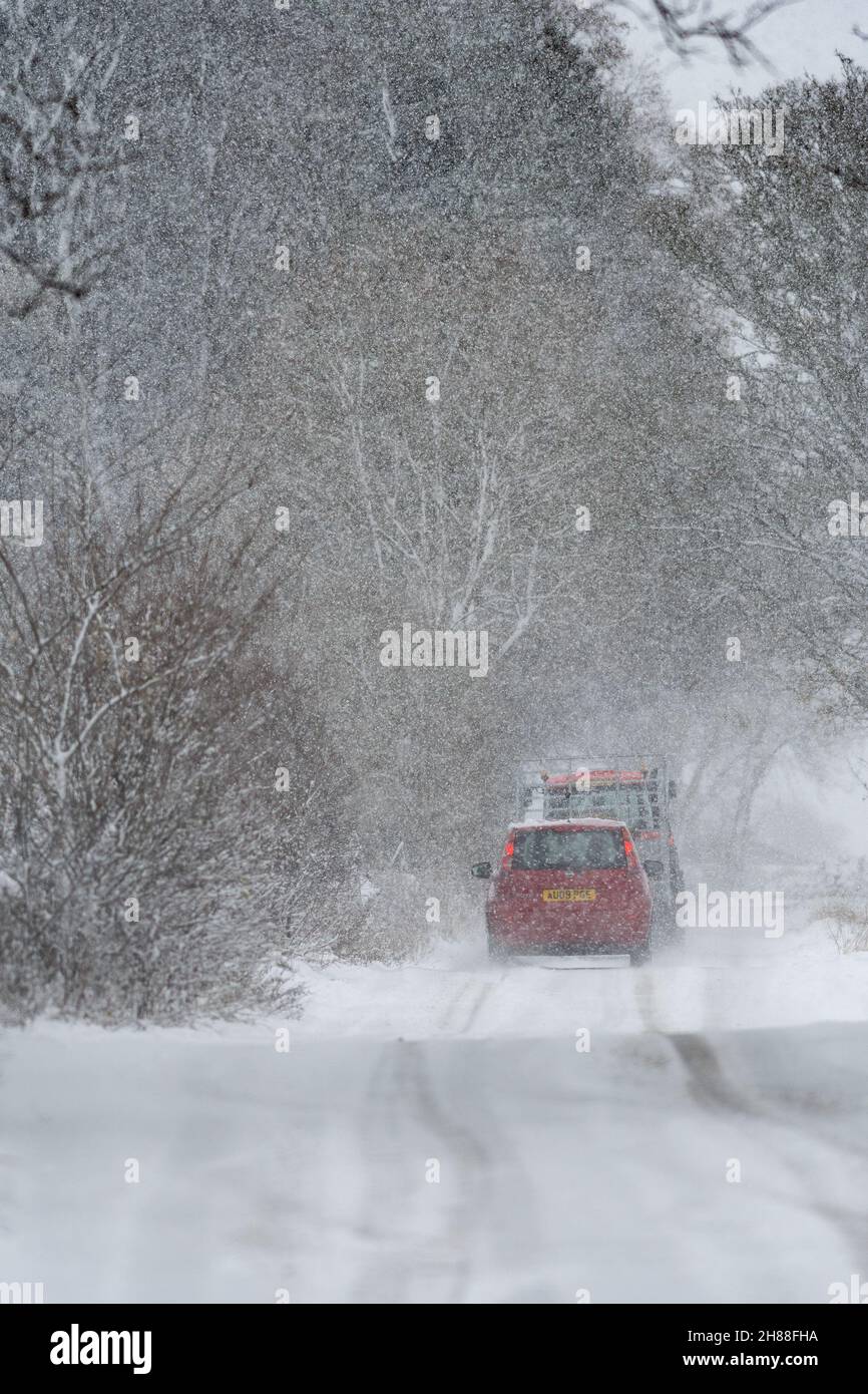 Hawes, North Yorkshire, UK. Nov 28th 2021 - Snow in the aftermath of Storm Arwen is making driving conditions difficult in the Yorkshire Dales, here at Simonstone, near Hawes in Wensleydale, UK. Credit: Wayne HUTCHINSON/Alamy Live News Stock Photo