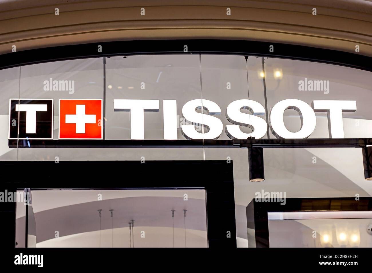 MOSCOW, RUSSIA - AUGUST 10, 2021: Tissot brand retail shop logo signboard on the storefront in the shopping mall. Stock Photo