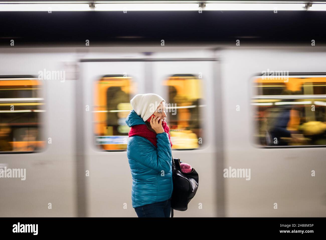Woman alone subway station hi-res stock photography and images - Alamy