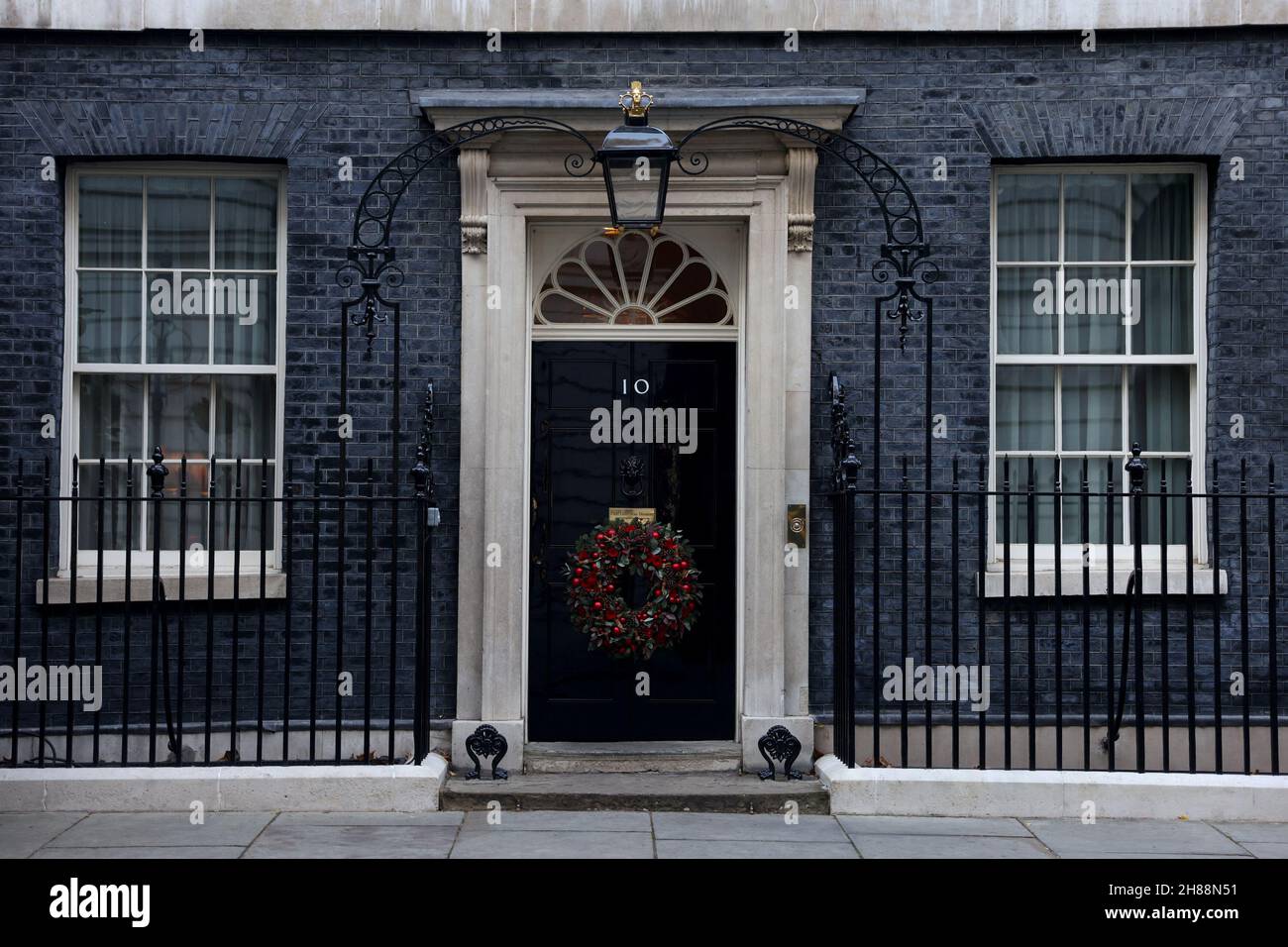 The door of 10 Downing Street is decorated with Christmas decorations in London, Britain, November 28, 2021. REUTERS/Tom Nicholson Stock Photo