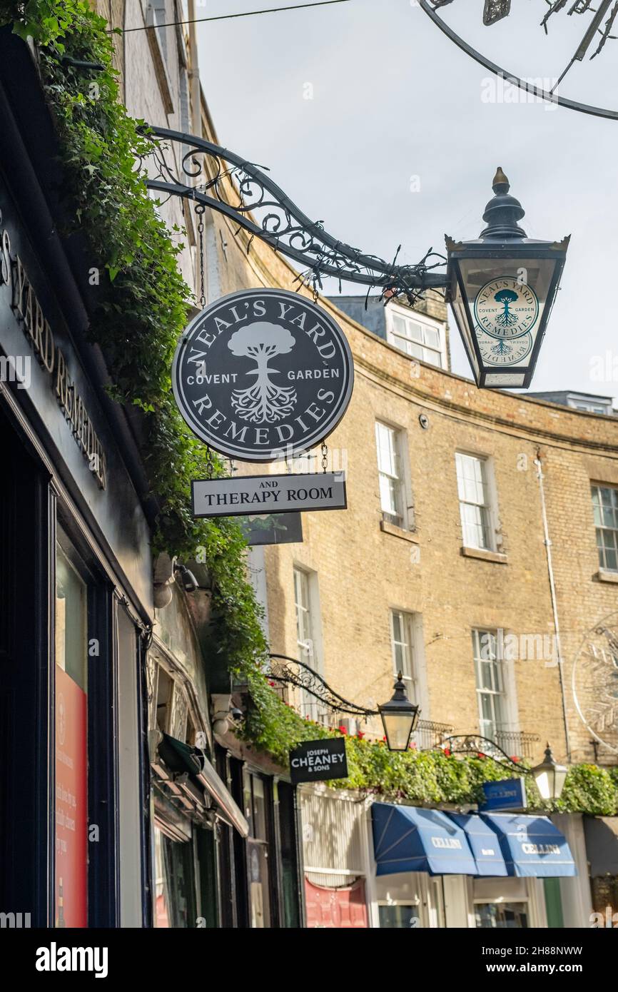 Cambridge, UK – November 18 2021. The exterior sign of Neal’s Yard Remedies store and therapy room in the city of Cambridge Stock Photo