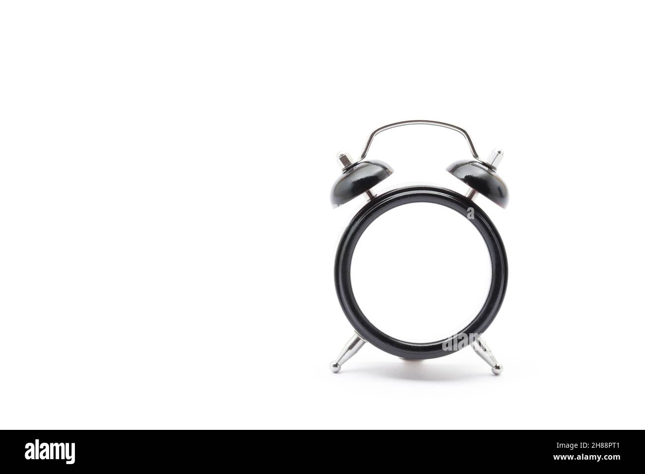 Black classic desk clock without dial on isolated white background with shadow Stock Photo Alamy