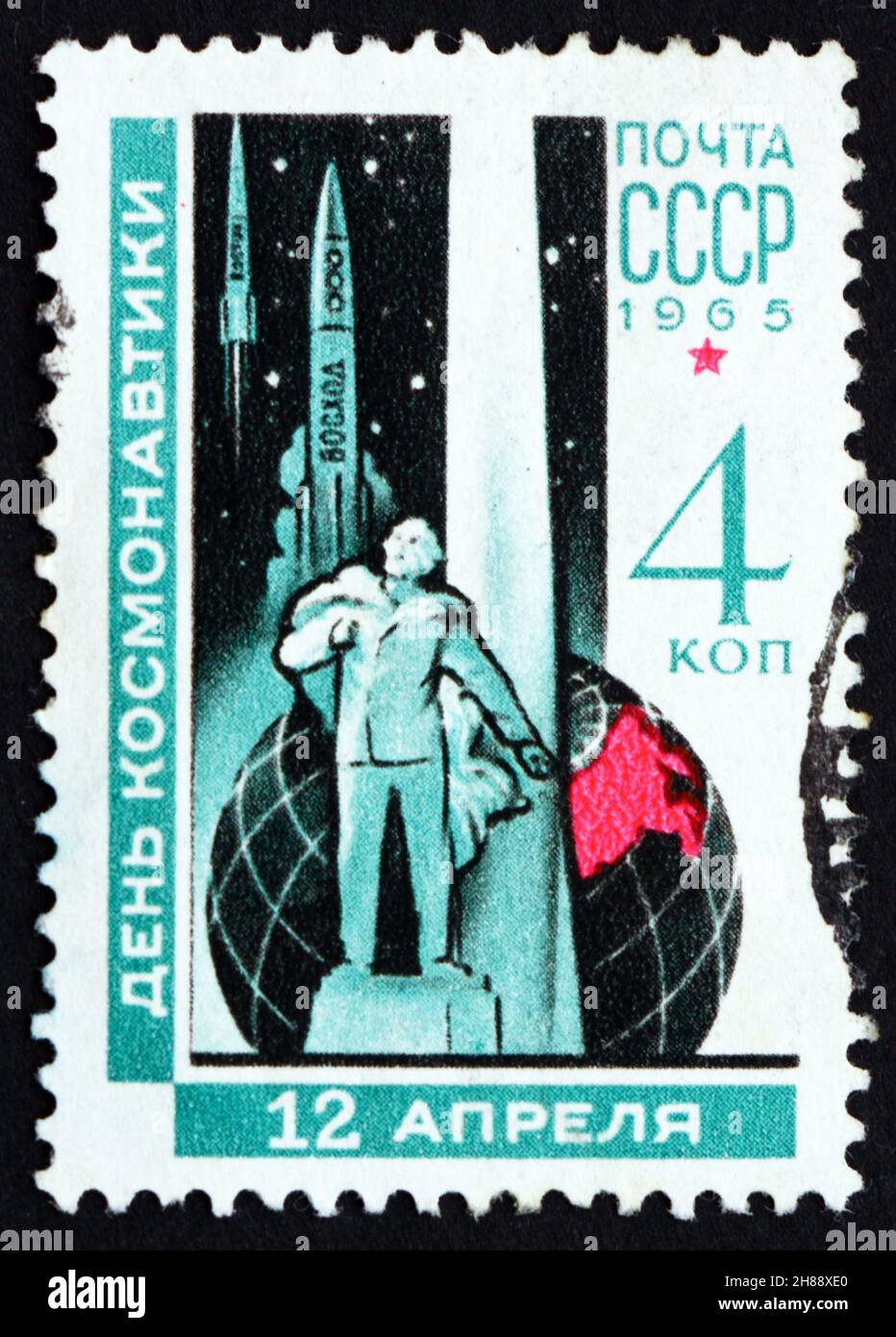 RUSSIA - CIRCA 1965: a stamp printed in the Russia shows Konstantin Tsiolkovsky Monument, Kaluga, Globe and Rockets, Rocket Scientist, circa 1965 Stock Photo