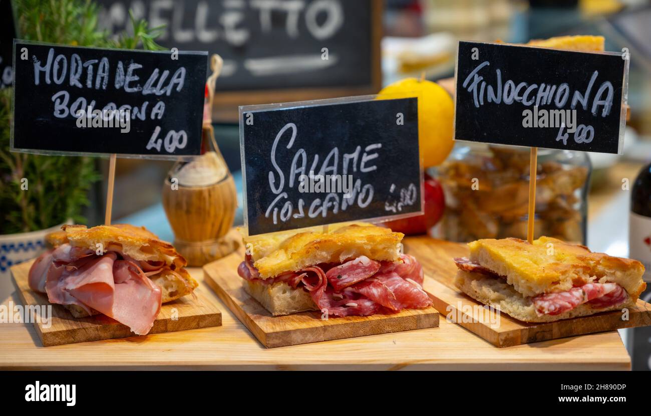 Italian street food, Parma ham sandwiches, bread with cured meats in