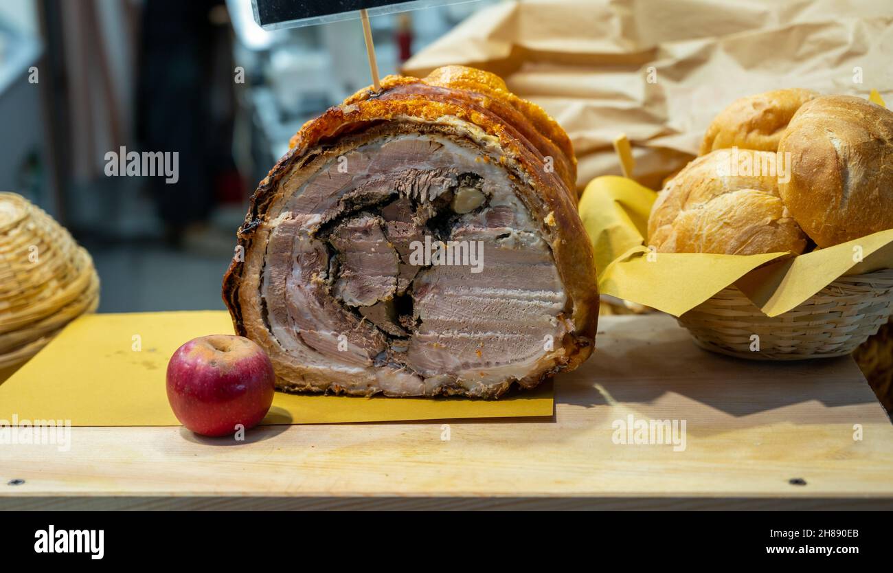 Italian street food, Parma ham, porcetta and bread in market in