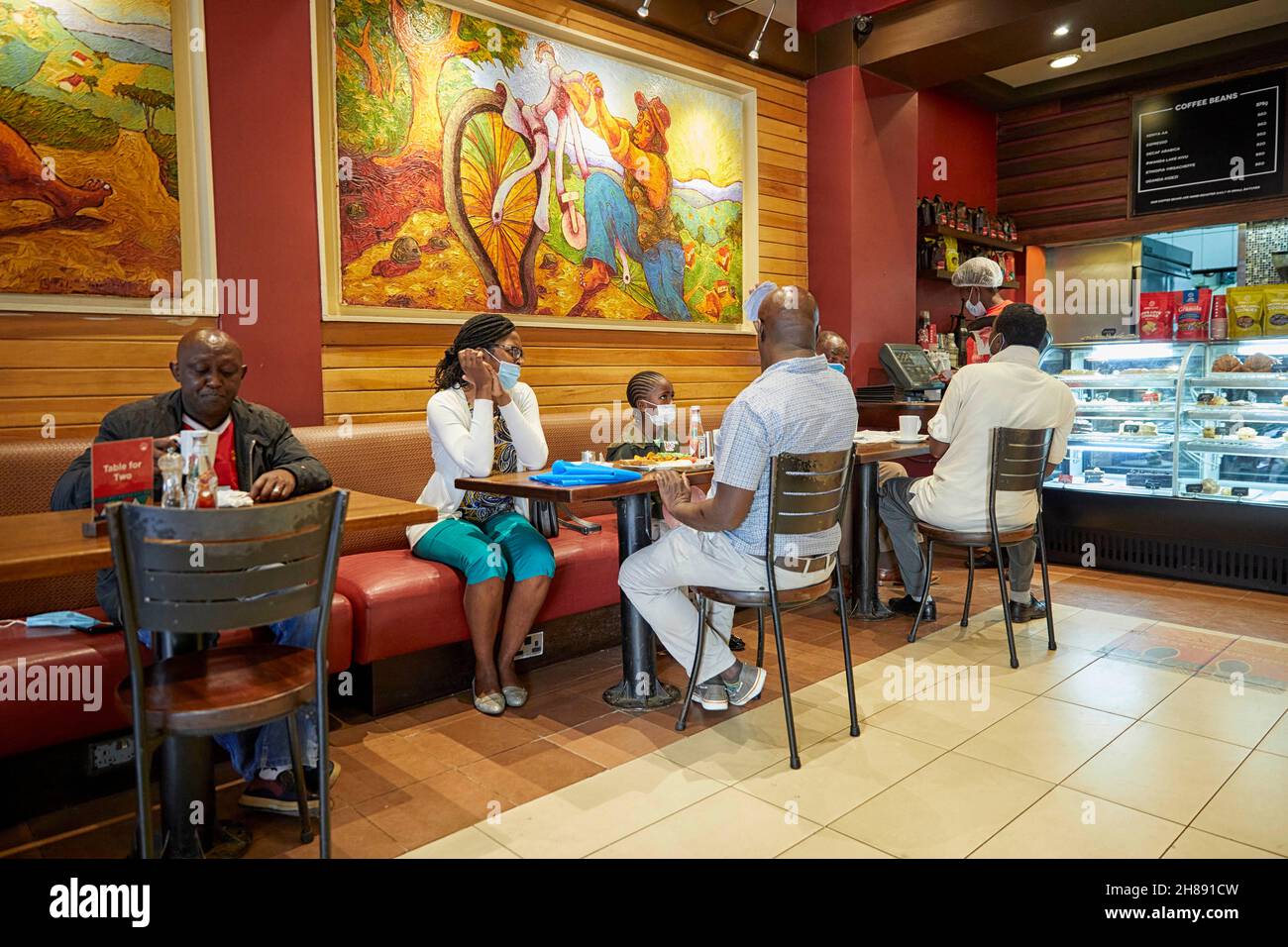 People enjoying themselves in Java House cafe in Nairobi Kenya Africa Stock Photo