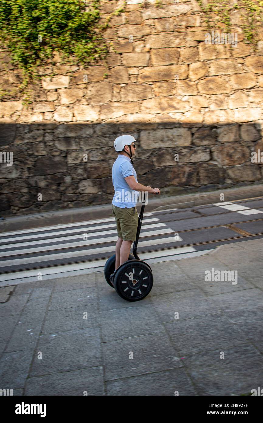 Man riding segway in Porto, Portugal. Stock Photo