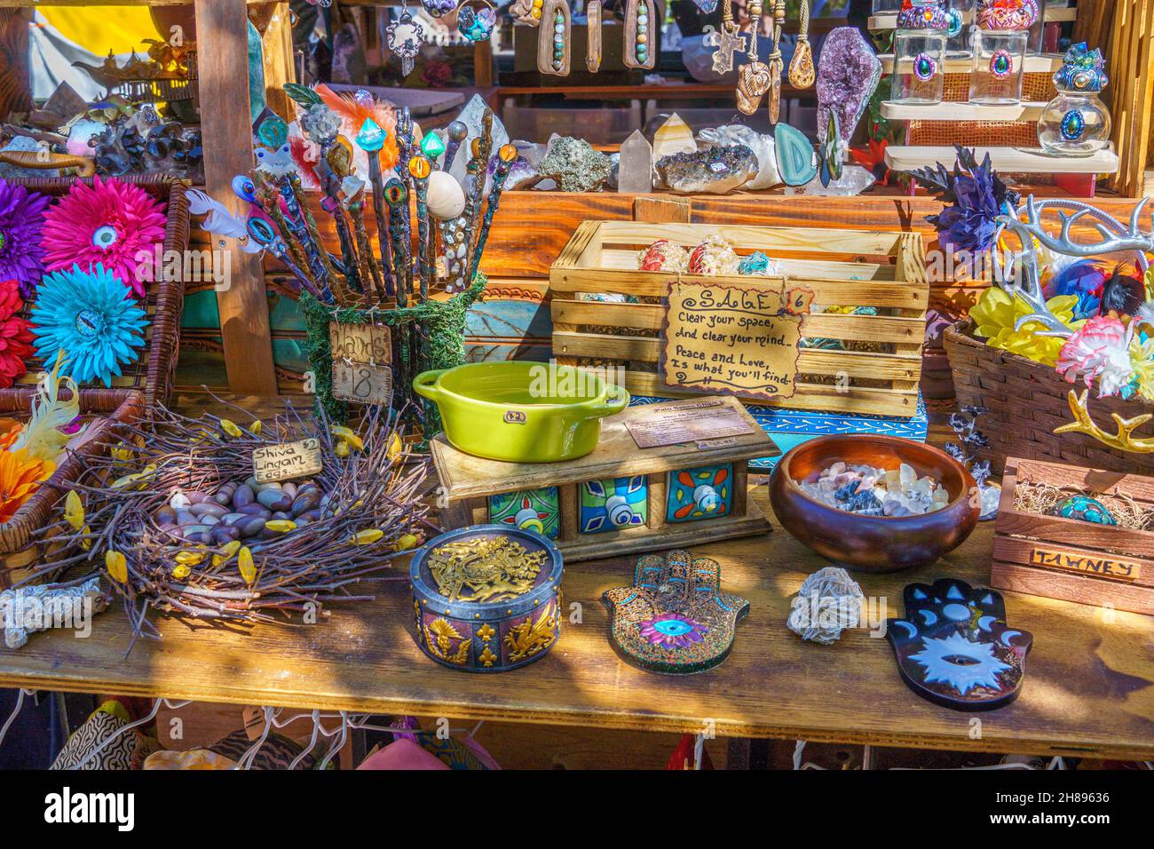 Closeup of stones, crystals, wands and other goods for sale at the Lady of the Lakes Renaissance Faire - Tavares, Florida, USA Stock Photo