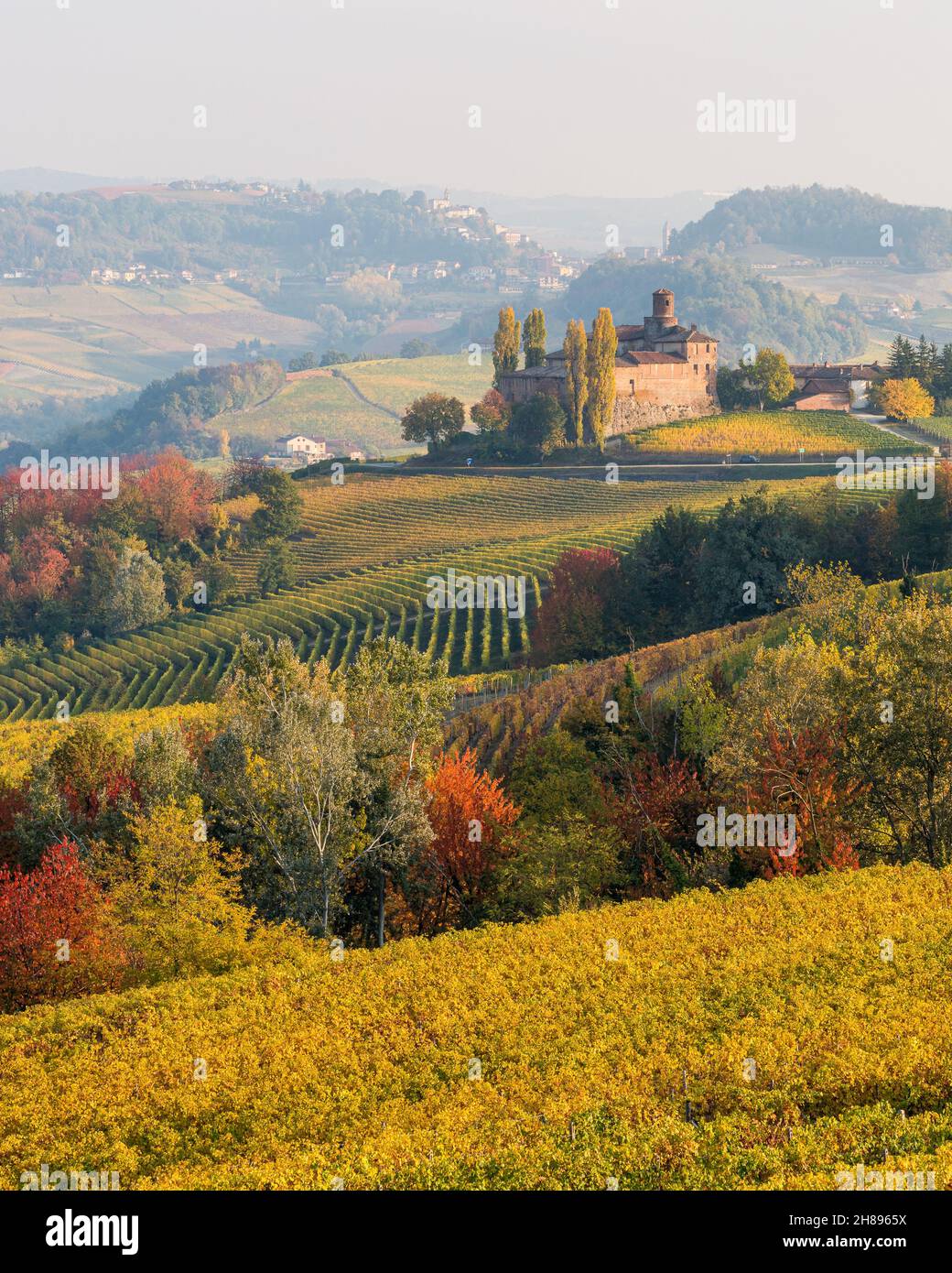 Beautiful autumnal landscape with the Castello della Volta, in the langhe region of Piedmont, Italy. Stock Photo