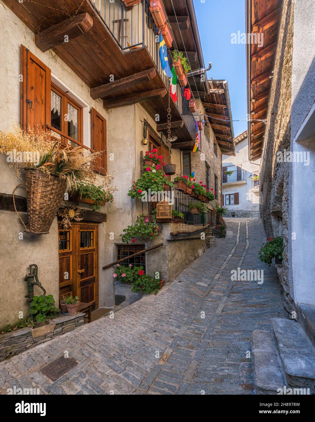 The beautiful village of Usseaux, during fall season, in Chisone Valley. Province of Turin, Piedmont, Italy. Stock Photo