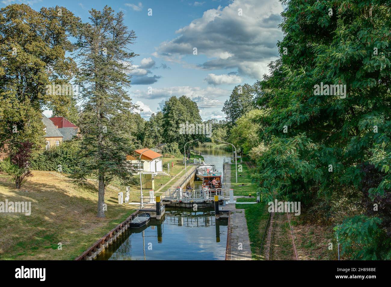 The Canow lock is located in the Müritz-Havel waterway and enables ships to overcome the different water levels between the Canower and Labus lakes. Stock Photo