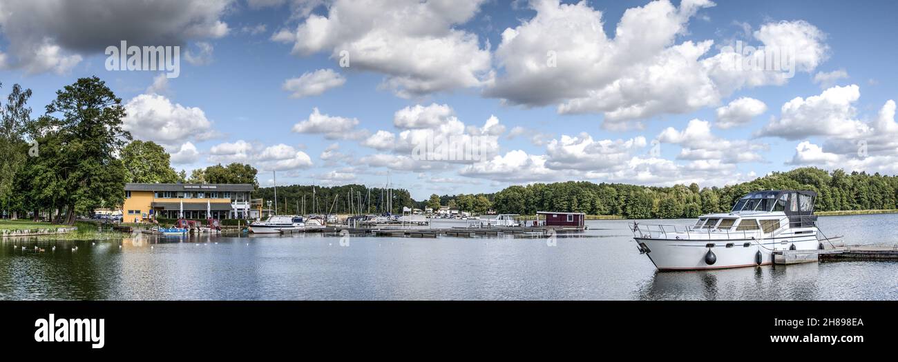 Boats, yachts and blue water - this is the marina of the city Fürstenberg on the Havel. Stock Photo