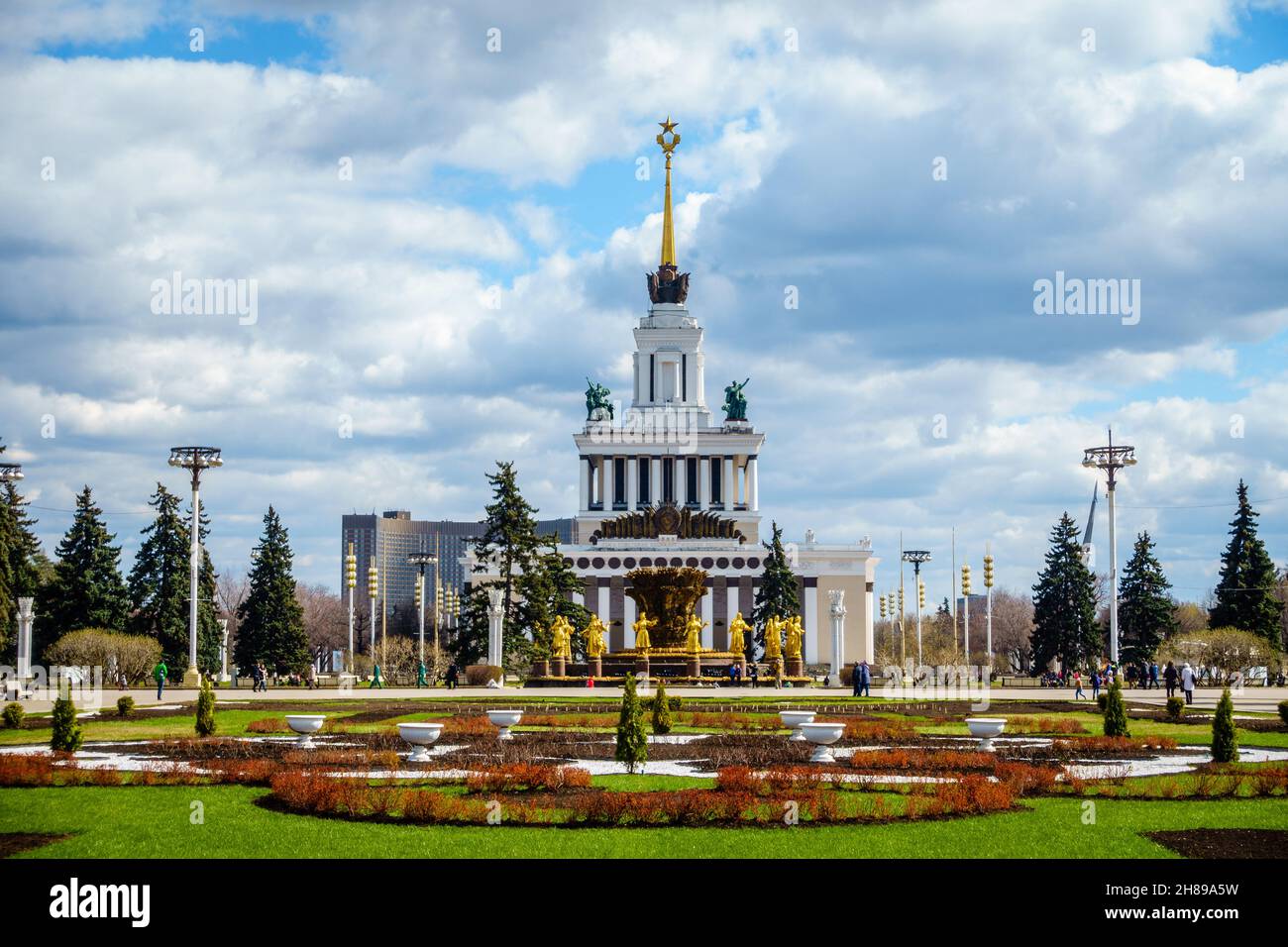 Moscow, Russia, April 23, 2016: Central Pavilion and the Friendship of Nations fountain at the Exhibition of Achievements of National Economy in Mosco Stock Photo
