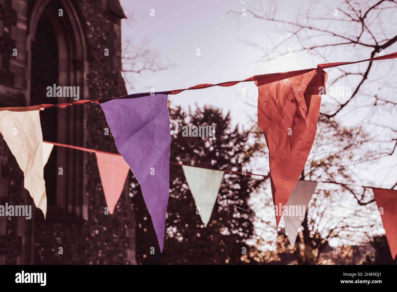 Vintage style bunting hangs outside to celebrate an event Stock Photo