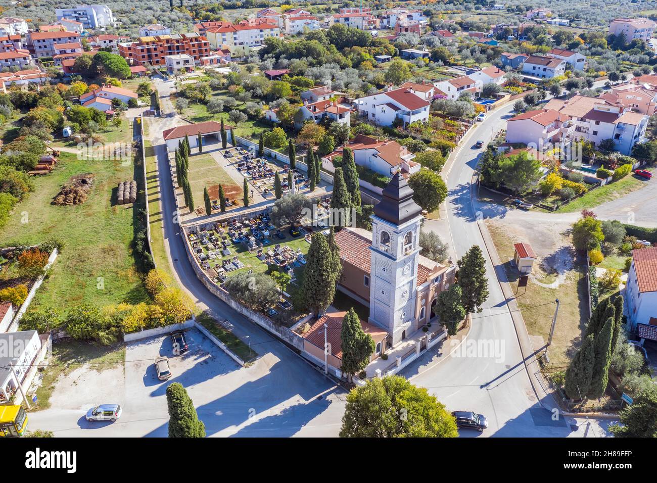 An aerial view of village Peroj, in foreground  orthodox Church of St. Spiridon, Istria, Croatia Stock Photo