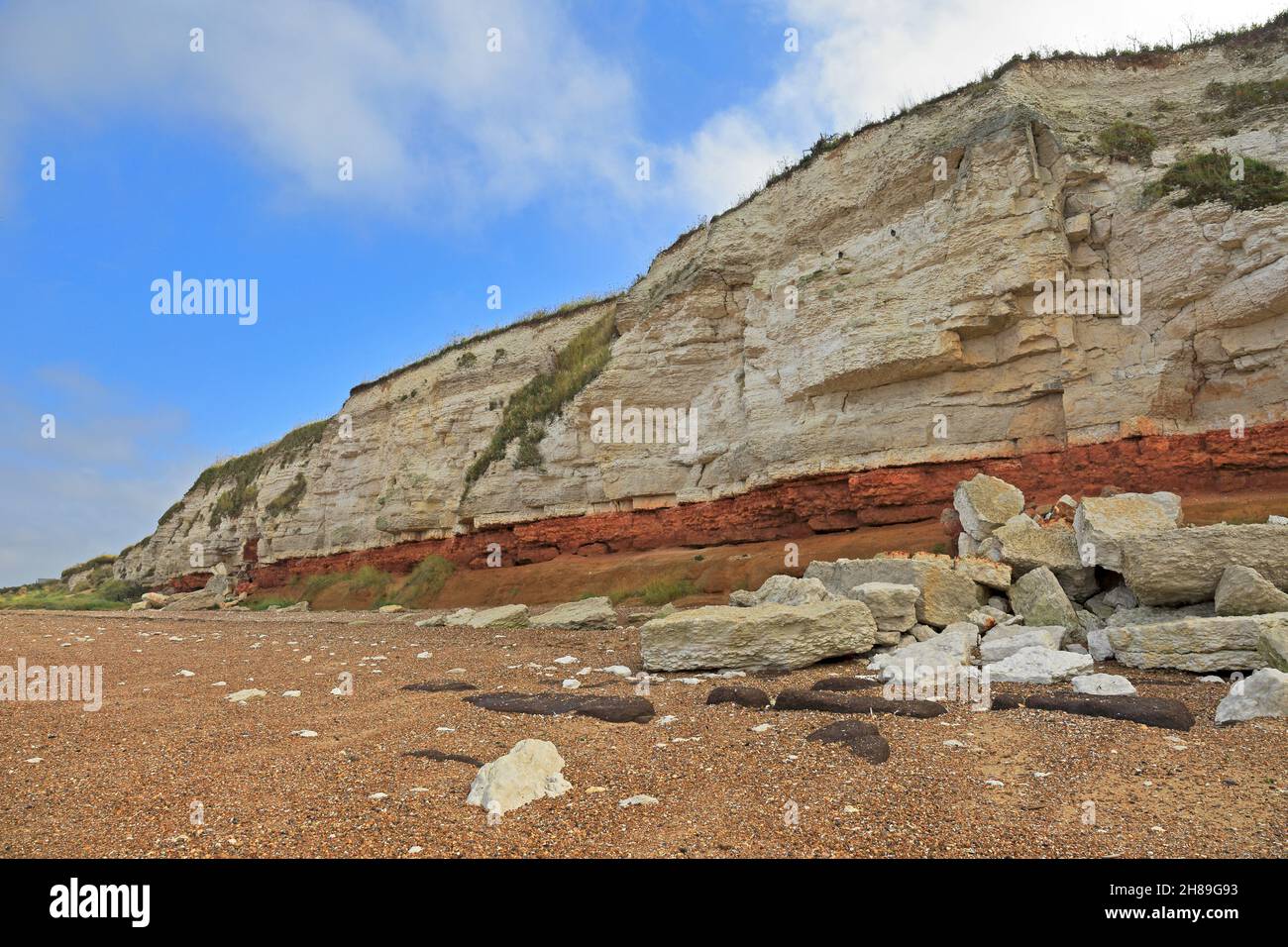 Red and white striped cliffs in Old Hunstanton on the Pedlars Way Trail and Norfolk Coast Path, Norfolk, England, UK. Stock Photo