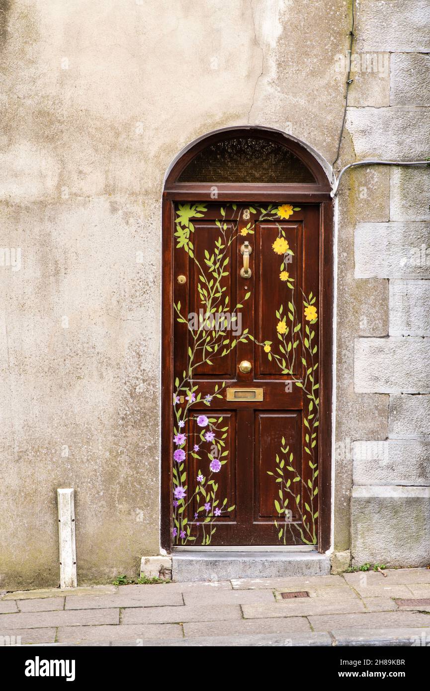 Hand painted watercolor illustration. An old style wood door decorated