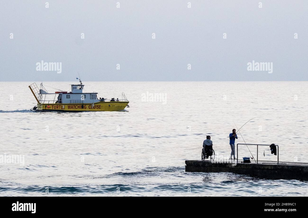 Two men fishing in a boat hi-res stock photography and images - Alamy