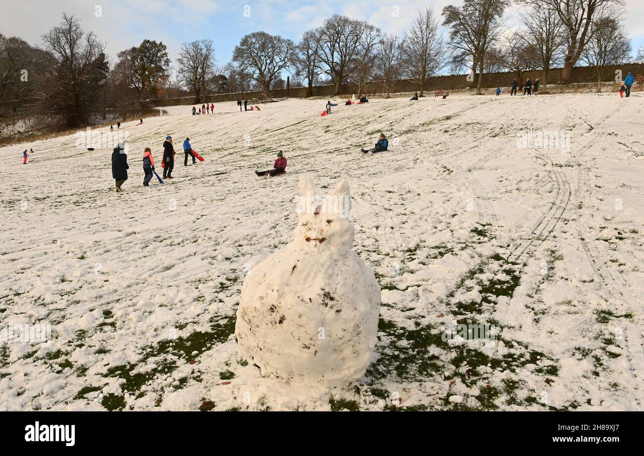 Peebles, Scottish Borders, Uk 28th Nov 21Heavy overnight snow hits the Scottish Borders to the delight of Peebles youngsters who enjoyed building a Snow Bunny and sledging in Hay Lodge Park Pic Credit: eric mccowat/Alamy Live News Stock Photo