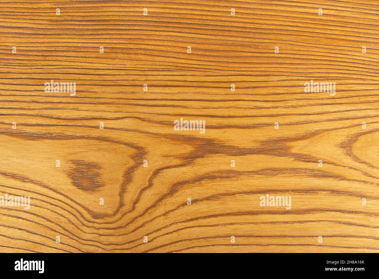 The appearance of oakcolored pine wood. Brushed board. Creative