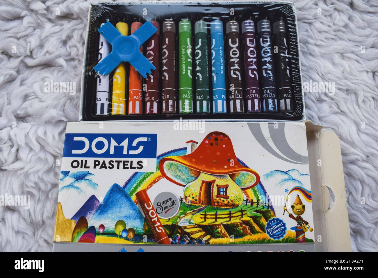 Doms brand Oil pastel colours. Oilpastels package consisting of 12 bright  shades of colours. Indian brand Doms art and school supply items company  Stock Photo - Alamy
