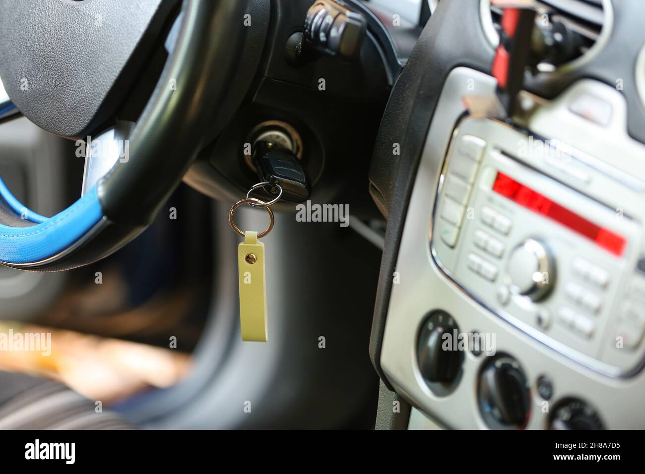 Key from modern car in ignition lock Stock Photo - Alamy
