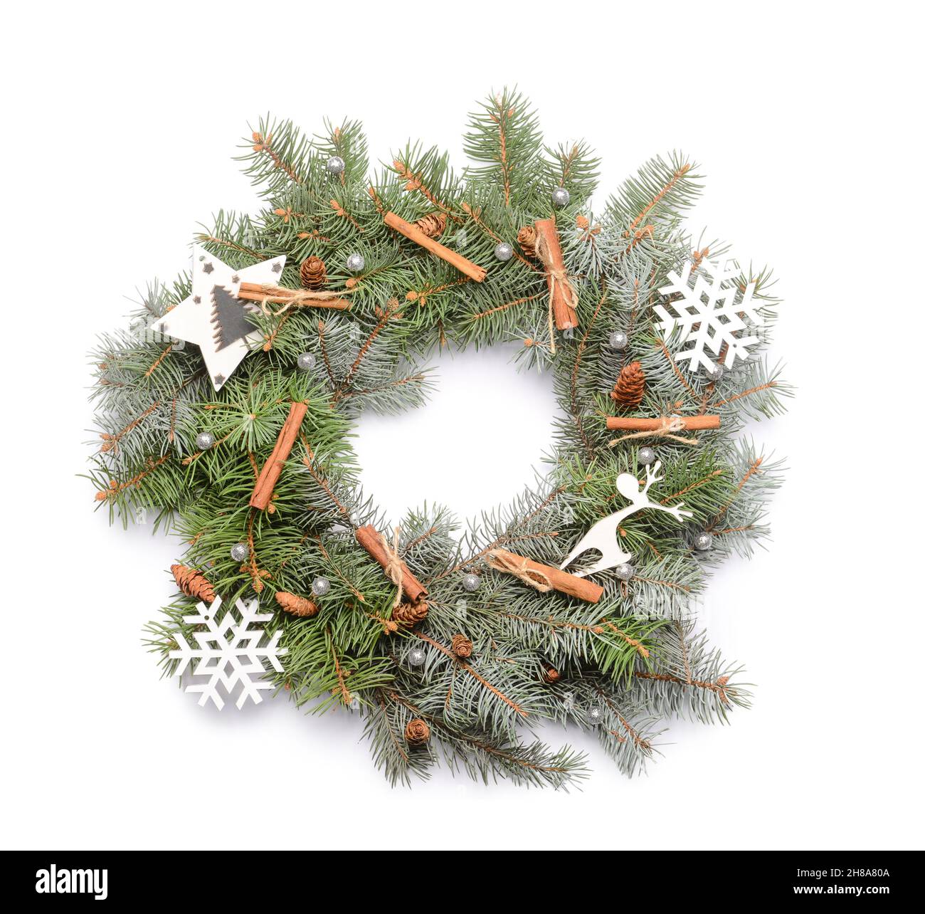 Beautiful Christmas wreath made of fir branches and decor on white ...
