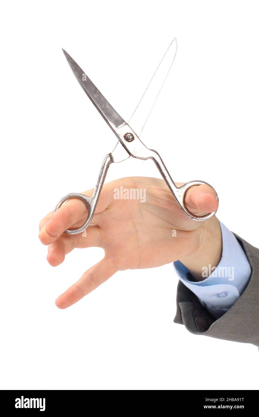 A pair of scissors in his hand the office worker Isolated on white background Stock Photo