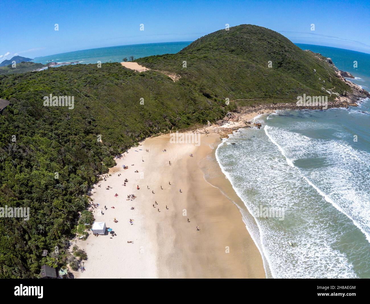 Aerial view of with mountains, forest and beach, Praia do Rosa ...