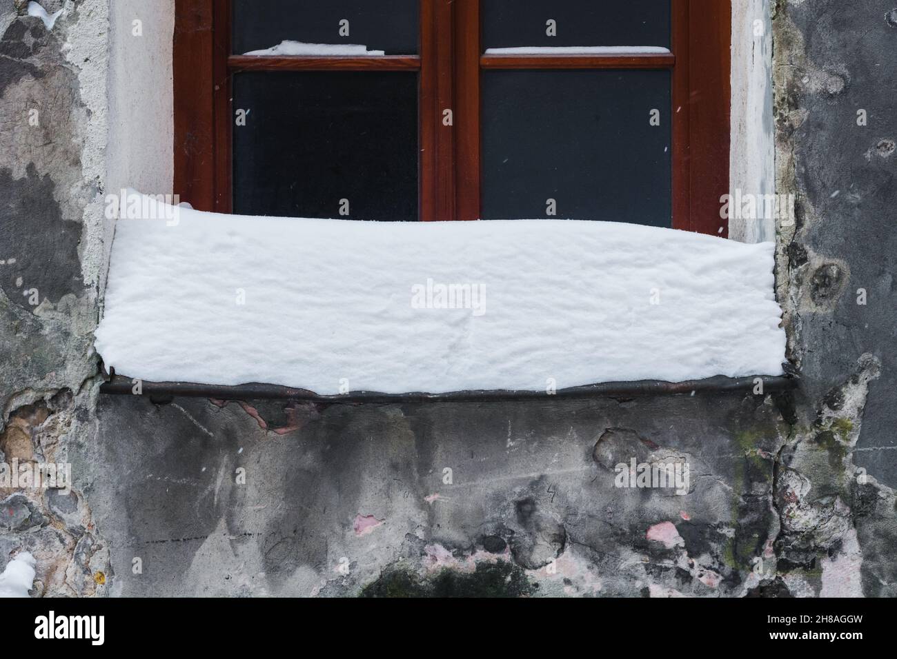 Lublin, Poland - February 13, 2021: Window at Dominikanska street covered by heavy snow in winter Stock Photo