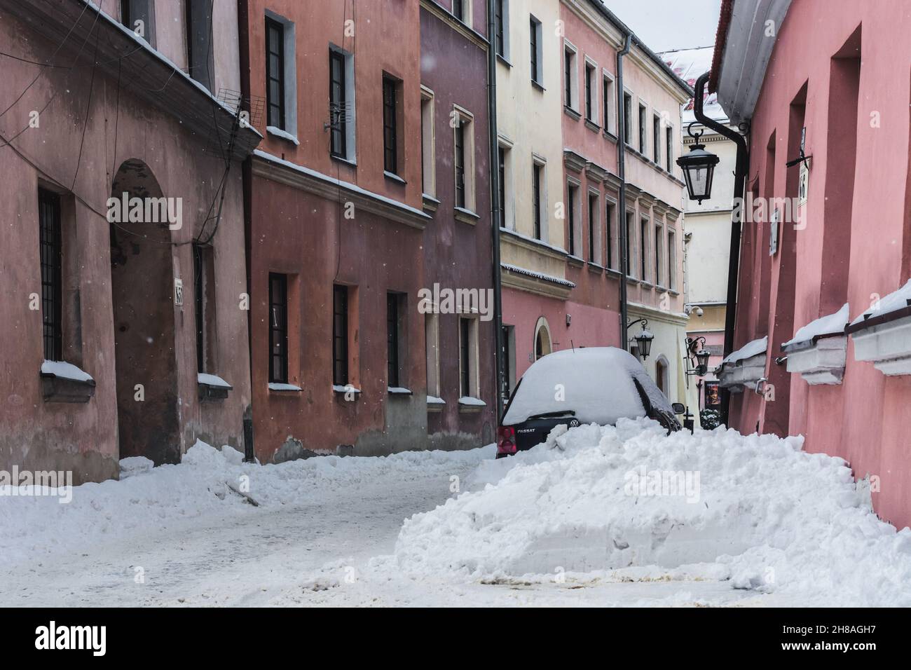 Lublin, Poland - February 13, 2021: Car parked in heavy snow at Jezuicka street in winter Stock Photo