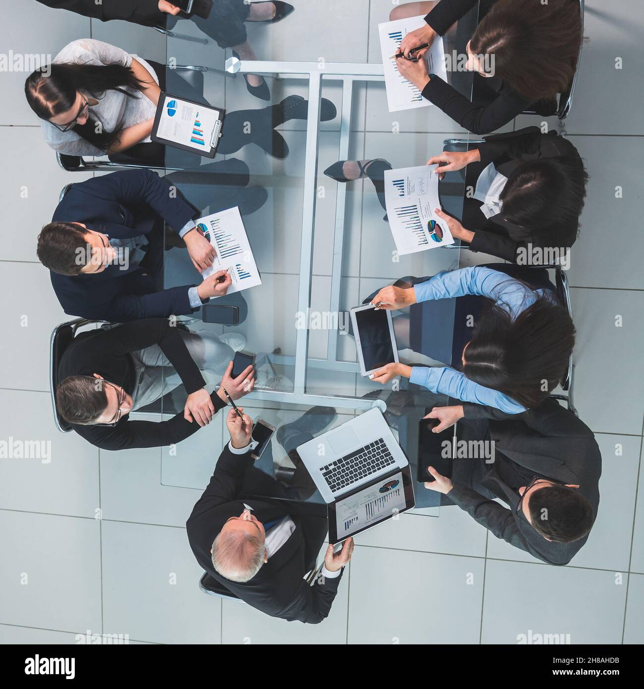 business team using a laptop to analyze financial data Stock Photo