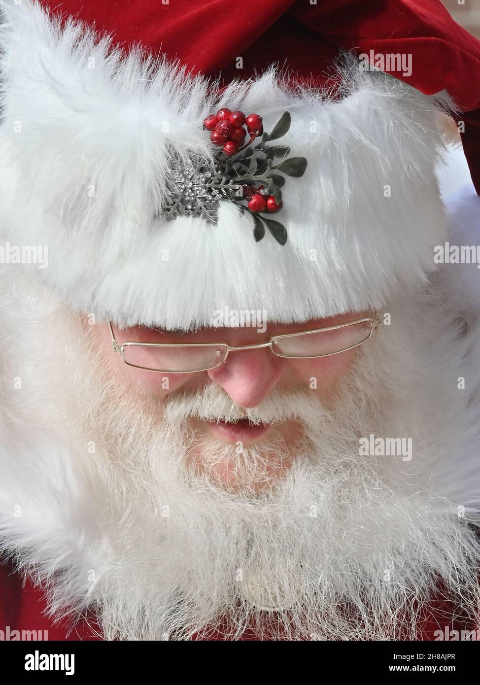 Wilkes Barre, United States. 27th Nov, 2021. A man portraying Santa Claus talks to children during a holiday market.A man portrays Santa Claus at a holiday marketplace and interacts with children as the kick off of the Christmas season on Small Business Saturday. Credit: SOPA Images Limited/Alamy Live News Stock Photo