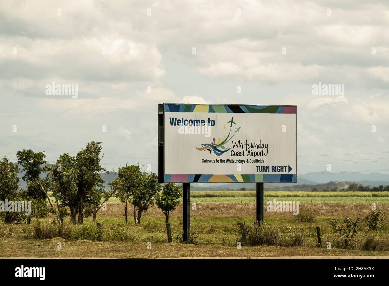 Bruce Highway, Townsville to Mackay, Queensland, Australia - November 2021: Billboard advertising Whitsunday Coast Airport Stock Photo