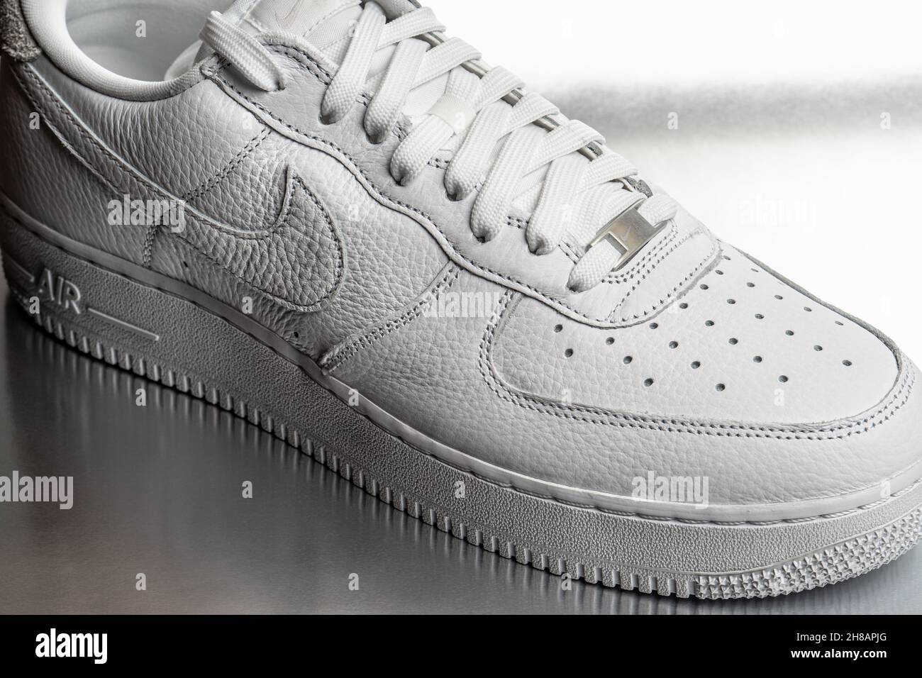 Moscow, Russia - November 2021: Nike Air Force 1 - white low classic basketball retro sneakers with Nike Air technology consists of pressurized air inside. Stock Photo