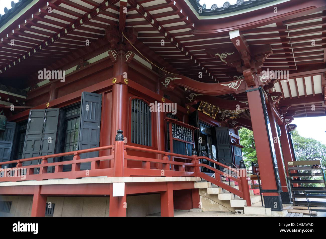 Main temple building at the Honryuin Temple, a Buddhist shrine dedicated to the god Kangiten in Asakusa, Tokyo, Japan. Daikon radishes are found at the shrine as a offering  for answered prayers. Stock Photo