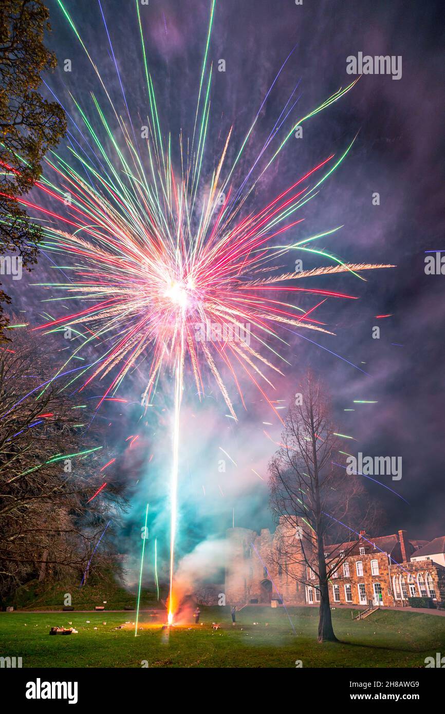 Tonbridge, Kent, England, 28 November 2021. Christmas lights switch on festival arranged by the Rotary Club Tonbridge, culminating in a firework finale in front of the historic Tonbridge Castle Credit: Sarah Mott/Alamy Live News Stock Photo