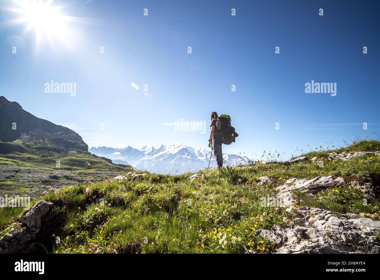 Silhouette hiker on rocky peak hi-res stock photography and images - Alamy