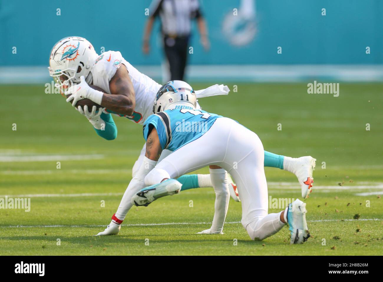 Miami Dolphins free safety Jevon Holland (8) walks off the field