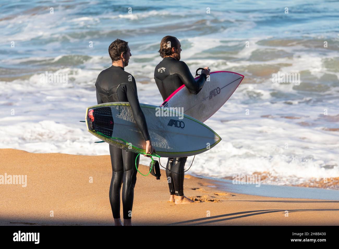 Two Men Wetsuits Surfers High Resolution Stock Photography and Images