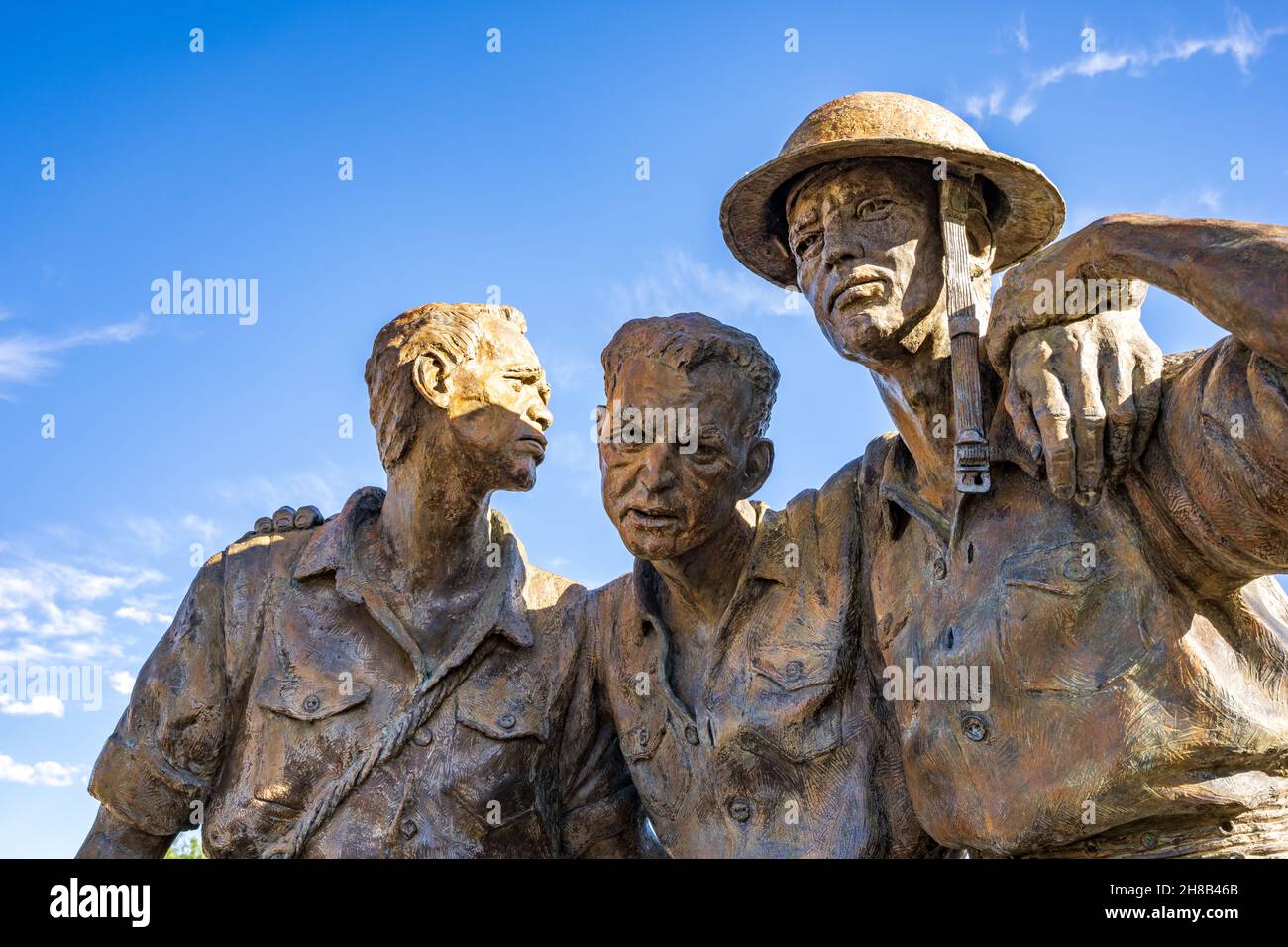 Las Cruces, NM - Oct. 11, 2021: Detail of the “Heroes of Bataan,” Bataan Death March Memorial statue in Veterans Park, by sculptor Kelley S. Hestir. Stock Photo