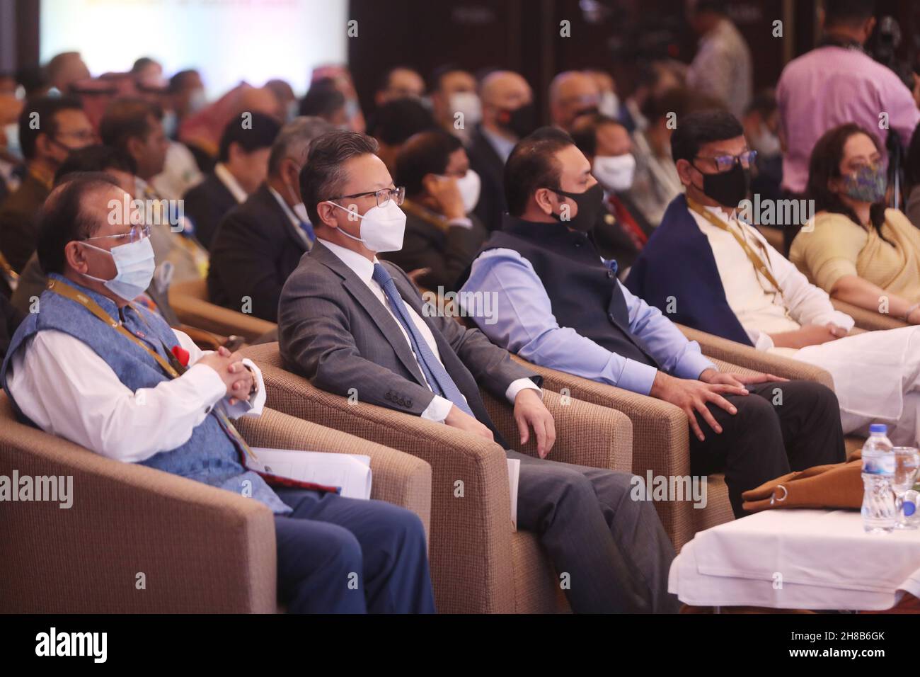 Dhaka. 29th Nov, 2021. Chinese Ambassador to Bangladesh Li Jiming (2nd L) attends an international investment summit in Dhaka Nov. 28, 2021. The two-day international investment summit has started in Bangladesh to help the country woo more foreign investment. Credit: Xinhua/Alamy Live News Stock Photo