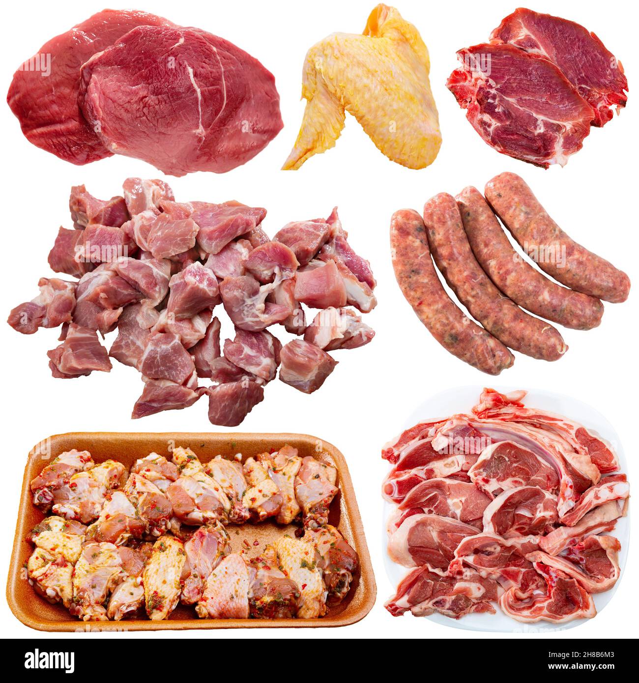 Assortment of various raw meat isolated on white background Stock Photo