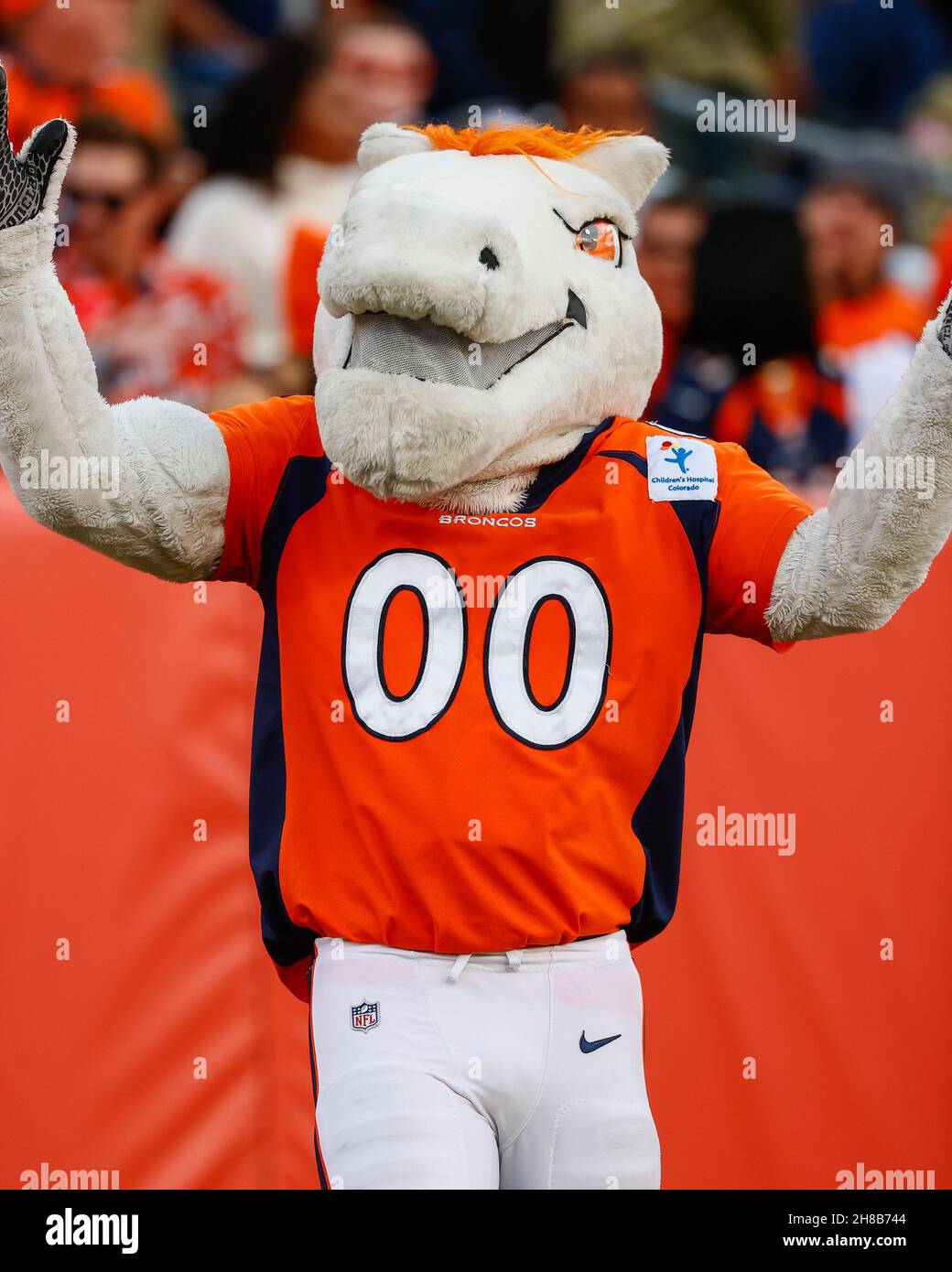 Denver, CO, USA. 28th Nov, 2021. Miles the Denver Broncos mascot patrols the sideline in the first half of the football game between the Denver Broncos and Los Angeles Chargers at Empower Field Field in Denver, CO. Derek Regensburger/CSM/Alamy Live News Stock Photo