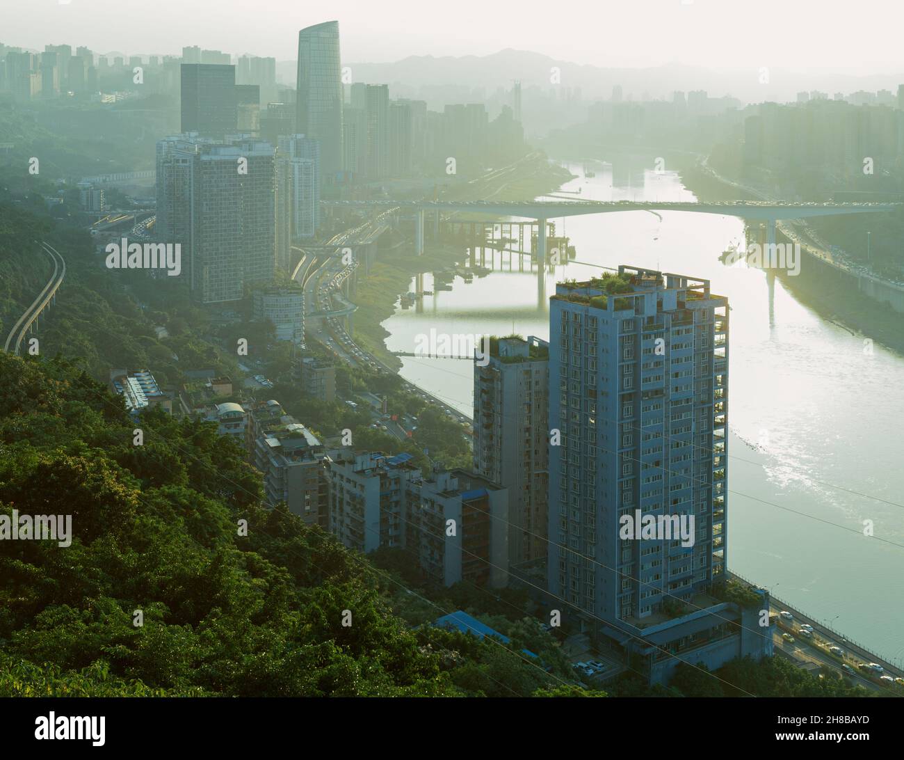 At the park, a distant view of the city along the Jialing River in Chongqing Stock Photo