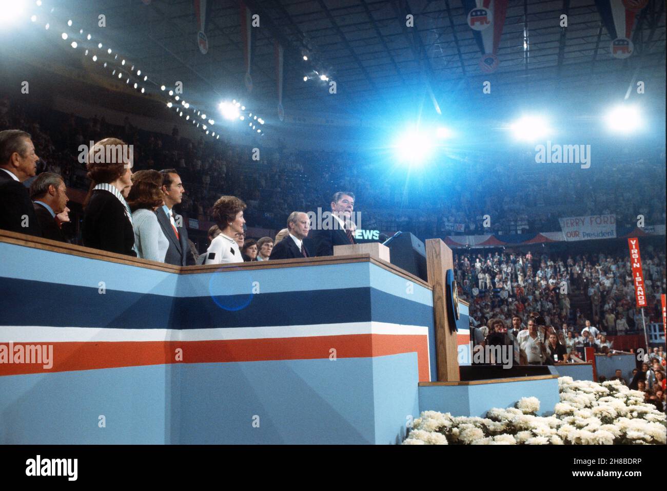 Former Governor Ronald Reagan (Republican of California), right, speaks from the podium at the 1976 Republican National Convention at the Kemper Arena in Kansas City, Missouri on Thursday, August 19, 1976.  Pictured from right to left: Governor Reagan; United States President Gerald R Ford, the 1976 Republican Party nominee for President of the US; Nancy Reagan; US Senator Bob Dole (Republican of Kansas), the 1976 Republican Party nominee for Vice President of the US; Elizabeth Dole, first lady Betty Ford, others.Credit: Arnie Sachs / CNP /MediaPunch Stock Photo